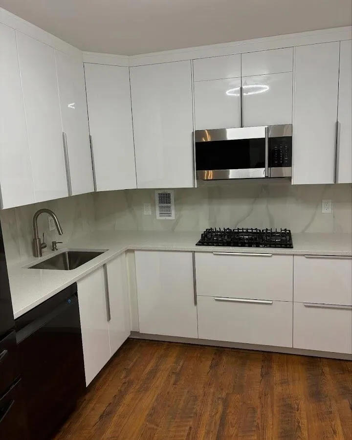 Restored kitchen with white cabinets after water damage in Mission